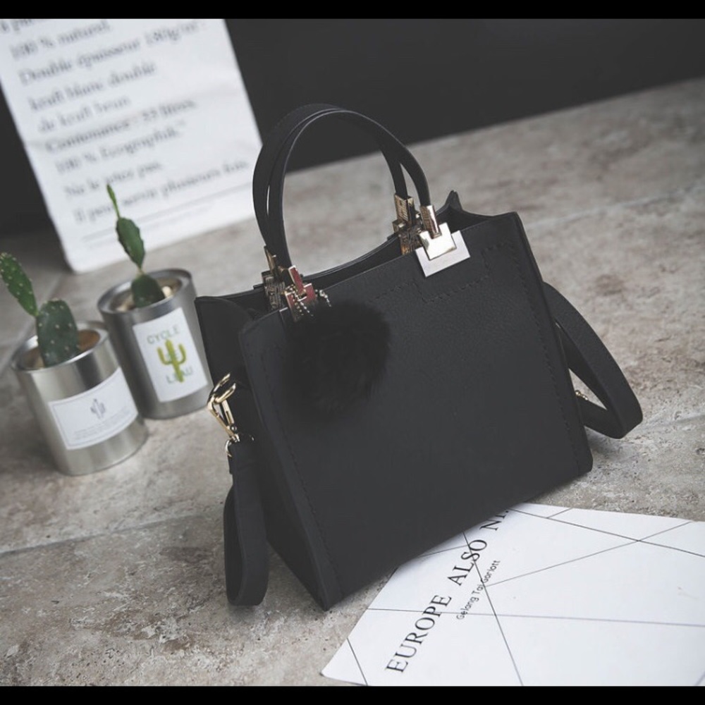 Mini Black Leather Hand Bag.